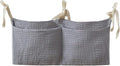 Bedside hanging bag for storing baby milk bottles and blankets by Unknown