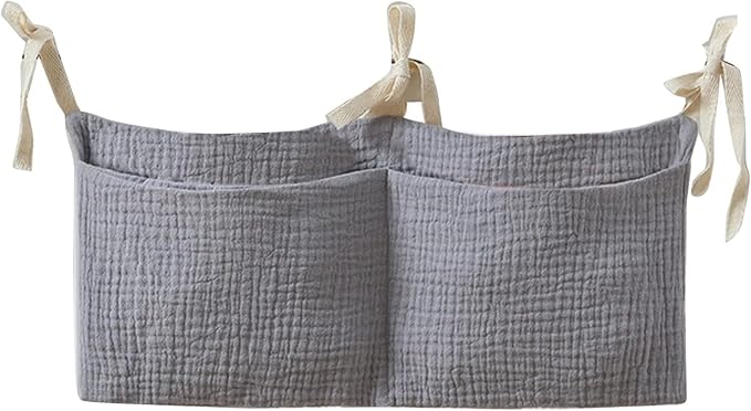 Bedside hanging bag for storing baby milk bottles and blankets by Unknown