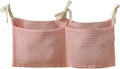 Bedside hanging bag for storing baby milk bottles and blankets by Unknown