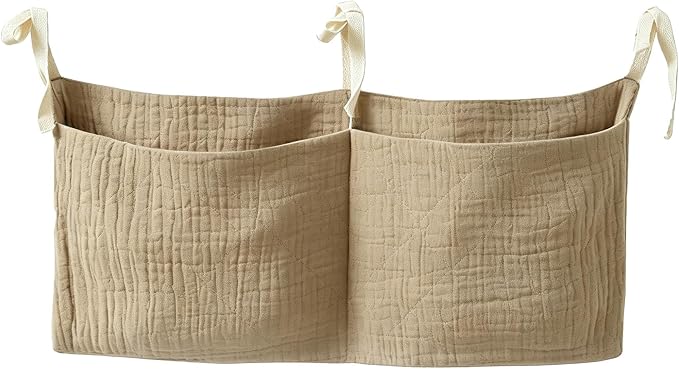 Bedside hanging bag for storing baby milk bottles and blankets by Unknown